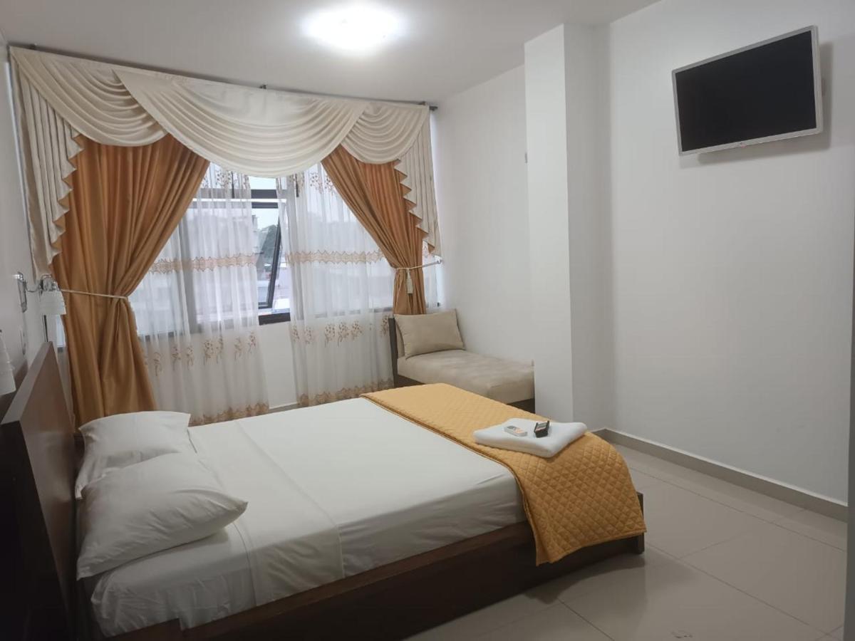 Hotel Quezada Hermanos Santo Domingo de los Colorados Buitenkant foto